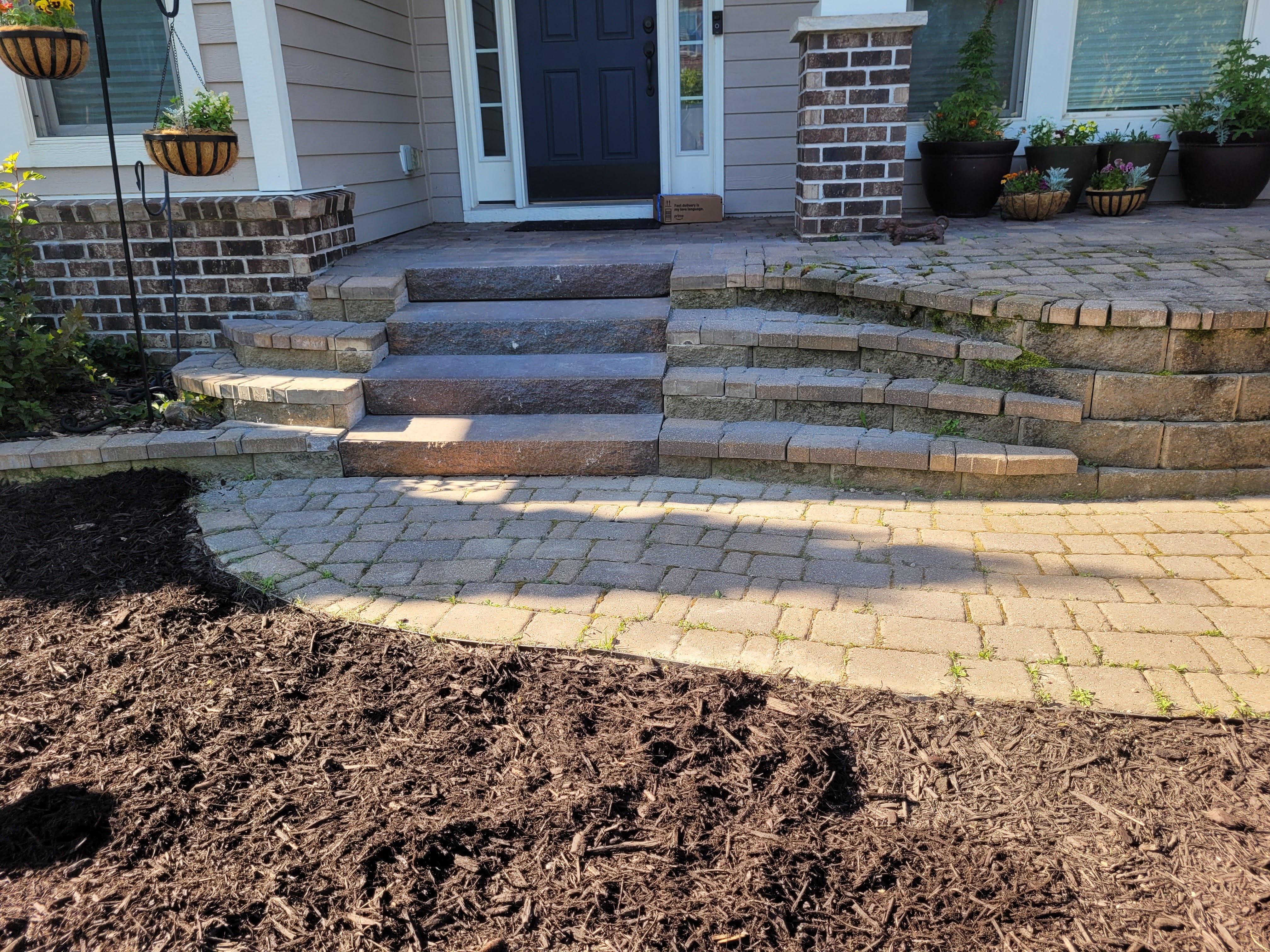 Brick steps leading to a home entryway